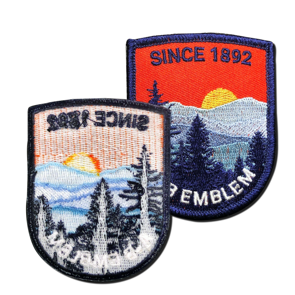 Image showing the back of embroidered patch. A-B Emblem. Since 1892. Iron-on backing shown.